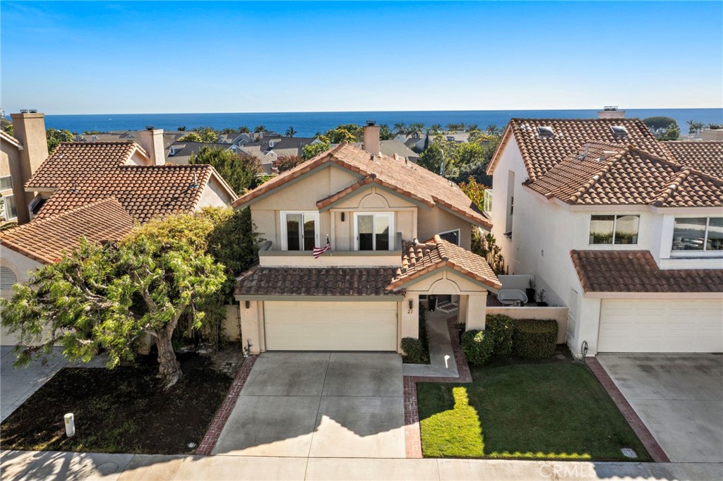 Welcome to 27 Palm Beach Court, an exquisite residence in the prestigious coastal enclave of Dana Point, CA. This elegantly remodeled home offers a harmonious blend of luxury and comfort across the 2,472 square feet of living space. With three spacious bedrooms and two and a half bathrooms, this home is a sanctuary of style and sophistication.
Step inside to discover a chef's kitchen designed to inspire culinary creativity, featuring stainless-steel Viking appliances, Carrera marble countertops, and ample storage space. The high ceilings throughout enhance the open and airy ambiance. And the high-end, designer, double-paned windows help preserve the tranquility within. For the warmer days, the Carrier A/C unit and modern smart control system keep the temperature comfortable.
The gated community provides exclusive access to a pool, spa, and a delightful barbecue area. For those seeking a serene lifestyle, the beach-close location promises beautiful ocean views and a refreshing coastal breeze. Located in the heart of Dana Point, the Regatta neighborhood is central to both essential and iconic destinations including Dana Hills High School, the vibrant Lantern Village, scenic trails through the Dana Point Headlands, and the glowing sands of Strands and Salt Creek Beach—all just minutes from the area's finest restaurants and coastal experiences.
This home combines elegance and functionality, offering a truly exceptional living experience.