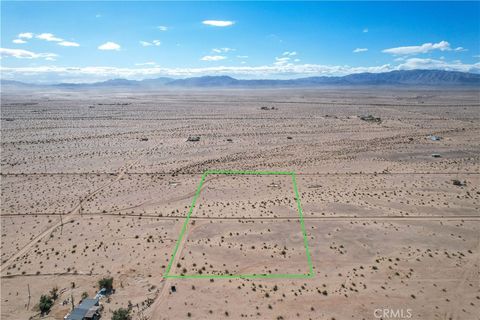 Photo of 82480 Pipeline Road, 29 Palms, CA 92277 (MLS # JT25257224)
