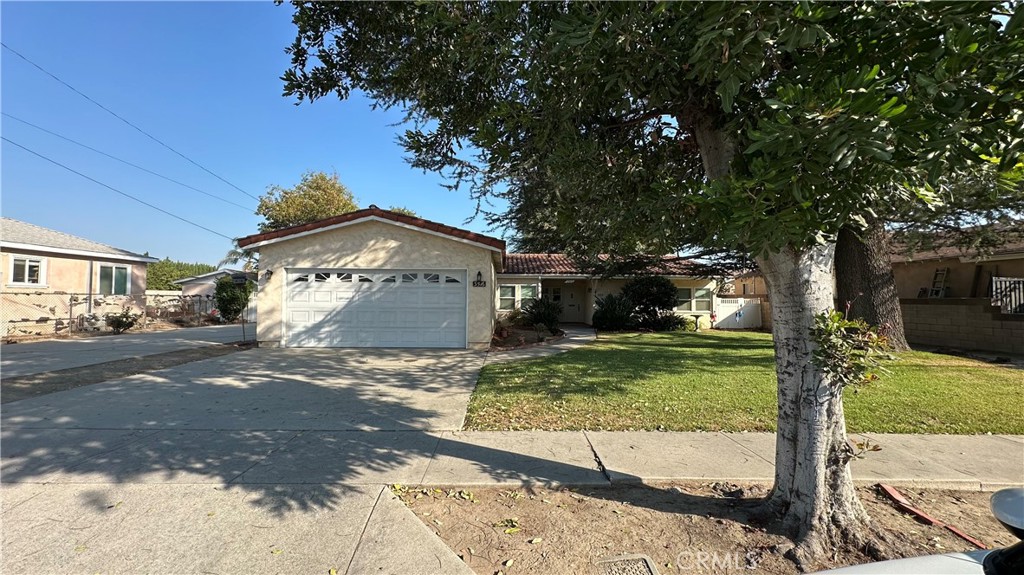 Level .45 Acre Home - All fenced in (Rear). 3 Bedroom, 2 Bath Single Story. All new double paned windows, new window coverings. Both Bathrooms upgraded. Carpet is less than 2 years old; all new baseboards. Attached Enclosed Patio - very useful for family gatherings. Two car garage - detached. Huge living room - light and bright; family room with brick fireplace. Yes, it has central air and heating. Very roomy laundry room - washer and dryer included. All furnishings are for sale. Close to shopping, schools and freeway access.
More Photos To Follow.