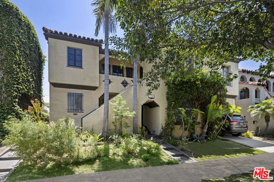 Investors and savvy end-users: This is the best deal in the area! Set back from the street amidst lush, drought-tolerant landscaping and mature leafy trees, this prime Carthay Mediterranean duplex promises incredible, lasting value for an investor or savvy end-user. Each apartment is huge and light-filled, complete with three bedrooms, two baths, large front porch, formal dining room, and laundry room, and one has an office. With the possibility to add up to two ADUs to the property (via garage conversion) for even more additional income, the upside potential is great! On either the ground level or second level, each home exudes charm, character, and original period details all preserved and lovingly maintained. Arched windows, wall niches, and doorways characterize the spaces as hardwood floors flow throughout. Kitchens and bathrooms are dressed in colorful tile, and bedrooms are spacious. Outside, a tranquil brick-laid patio is surrounded by walls of flourishing vines and blooming flowers, perfect for relaxing, entertaining, and dining al-fresco on warm summer evenings. In this coveted central location, fortunate residents enjoy access to some of the area's most sought-after attractions and destinations, such as the Beverly Center, The Grove and Original Farmers Market, Miracle Mile's museums, and Culver City's cultural center. The high-end shopping of Beverly Hills, nightlife of West Hollywood, and boutiques of Larchmont Village are also just moments away. Other nearby conveniences include parks, schools, and the 10 Freeway.