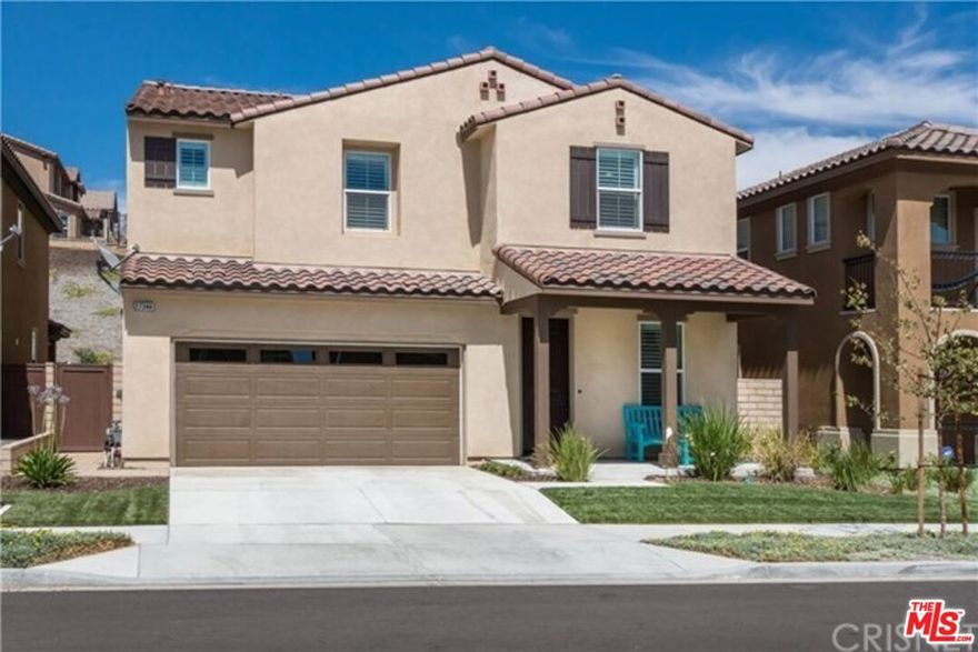Welcome to this like-new residence available for lease nestled in the picturesque community of Five Knolls in Santa Clarita. Built in 2015, this immaculate home boasts modern design elements and luxurious finishes throughout its spacious 2,815 square feet of living space. As you enter, you encounter the office/study room which is set aside from the rest of the house, allowing for a dedicated quiet space. The open-concept floor plan seamlessly connects the living, dining, and kitchen areas, offering an ideal layout for both entertaining and everyday living.The gourmet kitchen is a chef's delight, featuring sleek granite countertops, stainless steel appliances, ample cabinetry for storage, and a center island with bar seating. Adjacent to the kitchen, the cozy family room provides a comfortable space to unwind or enjoy casual gatherings. Retreat upstairs to the spacious primary suite, complete with a walk-in closet and a luxurious ensuite bathroom featuring dual vanities, a soaking tub, and a separate glass-enclosed shower. Two additional well-appointed bedrooms offer versatility and comfort, perfect for accommodating guests. The 2nd floor further features laundry room allowing for ease and convenience. Step outside to the private backyard oasis, where you'll find a tranquil retreat to relax and entertain. Whether you're enjoying a morning coffee on the patio or hosting summer barbecues with friends and family, this outdoor space is sure to utilized. Large 2 car garage complete with Epoxy flooring and extensive storage. Conveniently located in the coveted Five Knolls community, residents enjoy access to resort-style amenities, including Five Knolls Park, walking trails, and a community clubhouse with a pool and spa. With easy access to shopping, dining, and top-rated schools, this home offers the perfect blend of luxury, comfort, and convenience. Available starting July 1st, 2025.