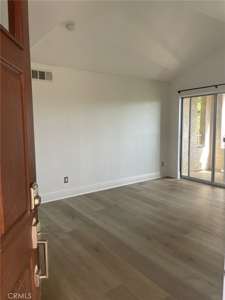 Bright & Cherry, Completely Updated 2 Bed, 2 Bath Condo in Sage Canyon. Upstairs Unit Boasts, Wide Plank Flooring, Open Concept Kitchen/Family Room Concept with Fireplace, Dining Nook, Breakfast Counter & Balcony with Views! Spacious Bedrooms Offer Ceiling Fans, Sizable Closets & Updated Bathrooms for Your Enjoyment. Inside Stackable Laundry Closet, Central A/C and 2 assigned Parking Spaces. HOA Amenities Include, Pool, 2 Spas, Volleyball, Basketball Court, Clubhouse, Gym, BBQ area & Trash, Water, Sewer are INCLUDED IN RENT. Move In Ready!