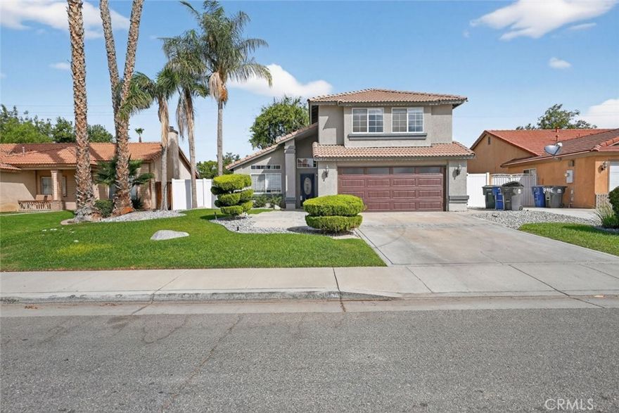 Welcome to this charming two-story single-family home offering 1,748 sq ft of comfortable living space on a generous 7,405 sq ft lot. Featuring an attached 2-car garage, this beautifully maintained residence combines modern upgrades with timeless appeal.



Upon entry, you're greeted by an inviting living room highlighted by a cozy fireplace, wood-style flooring, recessed lighting, ceiling fans, and high ceilings that create an airy, open atmosphere. The open floor plan seamlessly connects the living area to the dining and kitchen spaces, perfect for both entertaining and everyday living.



The kitchen boasts stainless steel appliances, recessed lighting, and plenty of cabinetry for storage. A stylish staircase leads to the second floor, where you'll find spacious bedrooms with mirrored closet doors. The main bedroom offers a relaxing retreat complete with a dual-sink vanity and ample closet space.



With its combination of space, comfort, and modern design, this home is ready to welcome its next owners.