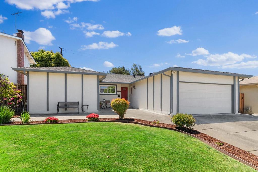 MAGNIFICENT MILPITAS GEM! This beautifully updated single-story home is tucked away on a quiet street with scenic foothill views & access to top-rated schools. Thoughtfully maintained & move-in ready, this beautiful home blends comfort & style. The inviting layout includes separate living & family rooms with abundant natural light perfect for entertaining or everyday living. The family room features a vaulted open-beam ceiling & cozy wood-burning fireplace. Enjoy fresh interior paint, new laminate flooring & new carpet in bedrooms. The updated kitchen is a chefs dream with quartz countertops, custom cabinetry with pull-out shelves, pot filler, built-in oven, coffee nook & ample storage. A separate laundry area with shelving adds convenience. The spacious primary suite includes an upgraded en suite bathroom with double vanity & dual closets. Step outside to a low-maintenance backyard designed for relaxing & entertaining, with raised beds for a vegetable garden. Additional highlights include Tesla solar panels, water softener, dual pane windows & automatic sprinkler system. Located just a short walk to top-rated John Sinnott Elementary & minutes from Great Mall, BART, Trader Joes, Costco, parks & major Hwys (680/880/237). Come see what makes this home & community truly special!
