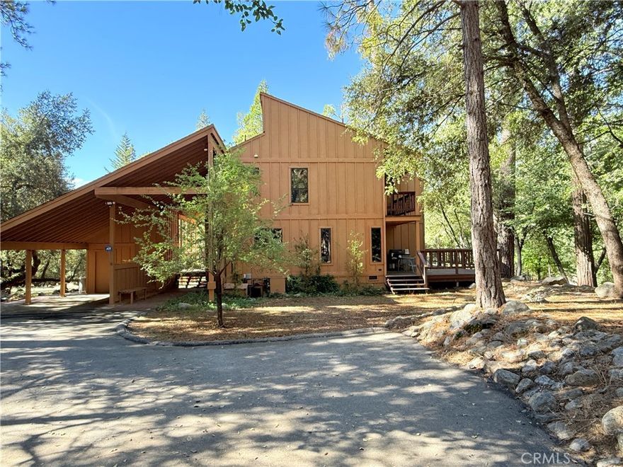 Looking for a HOME ON THE CHOWCHILLA RIVER?  This Beautiful, Custom Built home will afford you something hard to come by these days. Peace and Quiet, Less Stress and a SERENE VIEW OF NATURE LITERALLY right outside your door.  All the comforts of Country Living can be found right here with this Two-Story beauty featuring 3 Bedrooms (Two Master Suites) and 3 FULL Bathrooms. The two MASTER SUITES are located on the upper level. BOTH HAVE PRIVATE BALCONIES and a FULL BATH. At the center of the upper level is a LOFT AREA that is well suited for an office or sitting area. The main level features a Guest Bedroom off the Great room with a shared FULL Bath. Outdoors, enjoy listening to the sounds of flowing water as it meanders through the rocky bed of massive boulders. This part of the Chowchilla River can be enjoyed and appreciated all year long, most years. Tucked back in the midst of towering Pines is the sound of heaven. This property includes the adjoining parcel .89 ACRES to the West ensuring continued privacy in the years to come. If you are searching for a property that can TAKE YOU AWAY from all the hustle, bustle of daily life, do yourself a favor and come take a look. It doesn't get much better than this and very few properties here offer RIVER FRONTAGE like this one. Home is quality construction. Includes a security system, Wood Fireplace with Insert, handsome built-in bookshelves and a great location. Ponderosa Basin residents are privy to a Community Water System so there are no worries with a well. The Basin is a Charming, quiet, rural neighborhood, very popular and even has its own Church. Driving time to Mariposa or Oakhurst is a mere 25 minutes or so.  And as we in the business like to say.. There's a butt for every saddle.  This property is bound to fit yours. Come, take a look!!