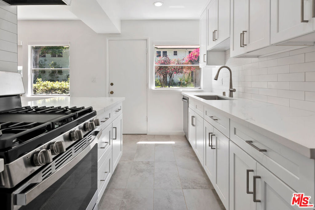 Modern 2-bedroom, 1.5-bath condo located just 5 minutes from historic downtown Culver City with its award-winning dining, boutique shopping, and vibrant nightlife. Set in a secure gated community with 24/7 guardhouse security, this fully renovated home features a bright open layout, updated kitchen, spacious living and dining area, and in-unit washer and dryer. Enjoy a private garage with storage, access to a swimming pool and tennis courts, and beautifully landscaped grounds. The unit also includes a private planter with a built-in sprinkler, perfect for growing your own vegetables or herbs.