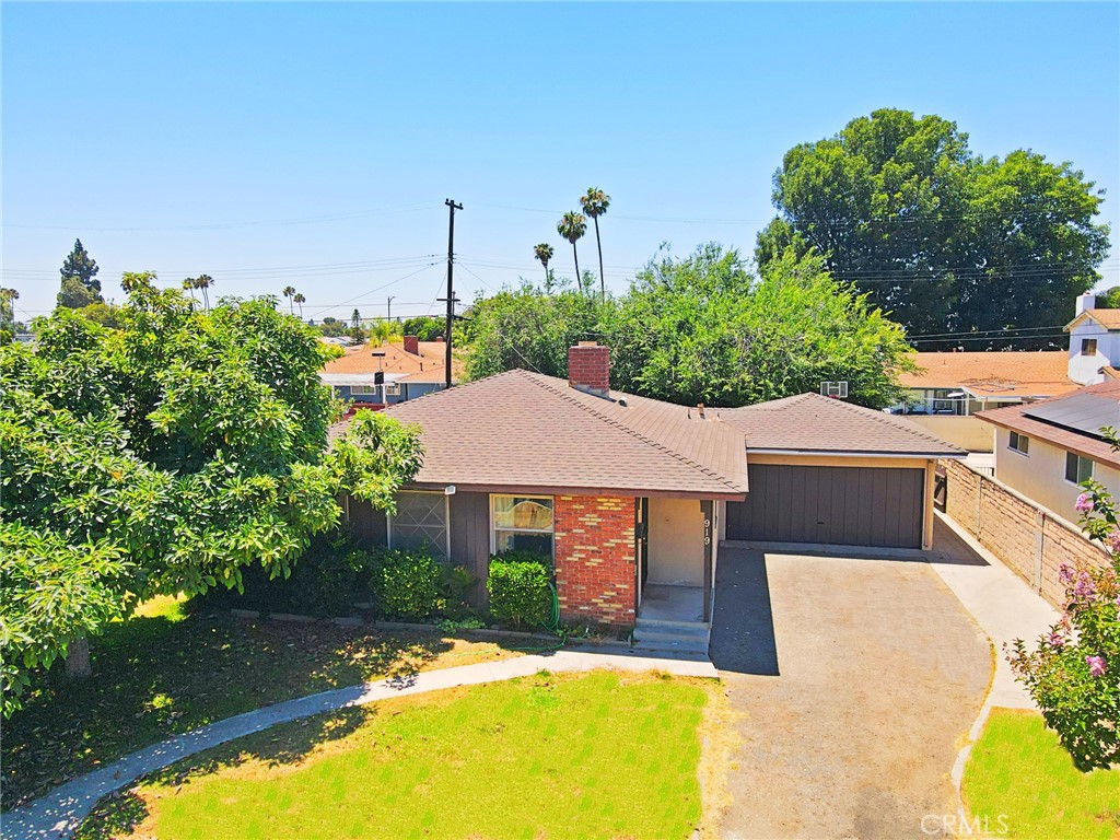 ****SELLER WILL ENTERTAIN OFFERS BETWEEN $759,900-$799,900****GREAT OPPORTUNITY TO FIX UP AND SAVE! With 3 bedrooms and 2 full baths, this wonderful single story has lots of potential. With a great floorplan and flat lot with grassy areas this home is great for all types of families or investors. As you enter the front door is the open family room with cozy fireplace and lots of natural light. The nearby dining area overlooks the family room which make it great for entertaining friends & family. This charmer has wood-like laminate flooring throughout, plush carpeting, ceiling fans, good sized closets and two car garage with high ceilings. Extra long driveway make it convenient to park multiple cars. The yard also has a high producing avocado tree and lush grass. You can also enjoy a 5-min walk to Servite High School, short drive to desired Dad Miller Golf Course and convenient shopping, restaurants and freeway access nearby! This home will not last long on the market!