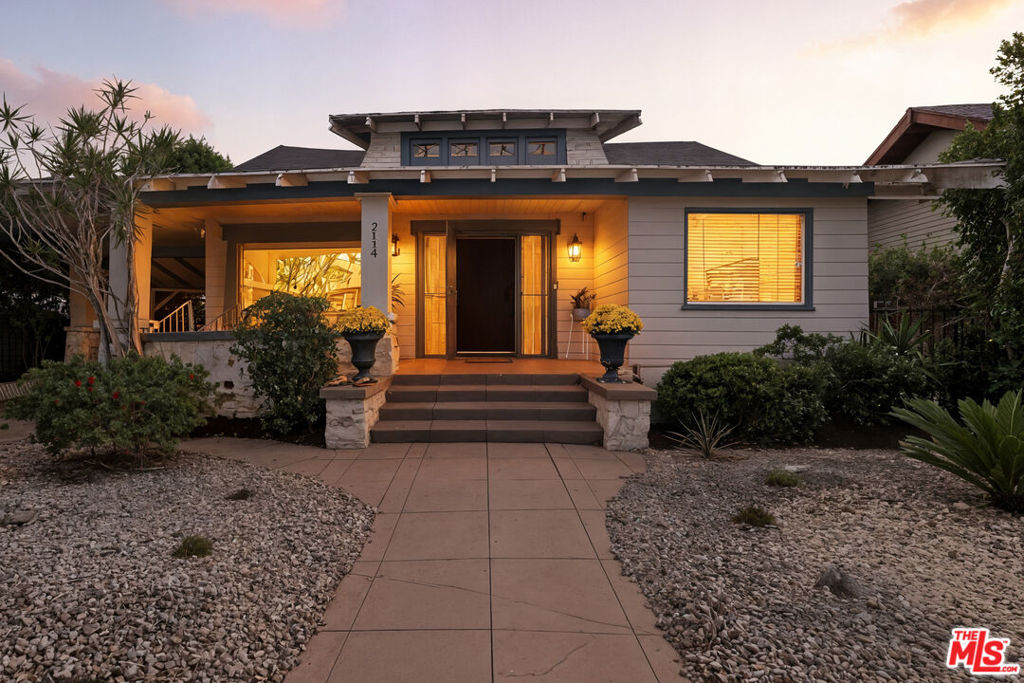Come experience this beautifully preserved 1910 Craftsman-style home, rich with history and timeless character. From the moment you arrive, you'll appreciate the drought-tolerant landscaping, gated entry with remote access, and a spacious front porch that perfectly showcases the home's classic charm. Step inside to discover a warm interior featuring original woodwork, exposed beams, decorative wainscoting, and period details that highlight the craftsmanship of the early 1900s. The generous living and dining rooms are ideal for entertaining, while large windows fill the space with natural light. The kitchen retains its classic appeal and provides ample counter space and cabinetry. Four comfortable bedrooms offer peaceful retreats, while two bathrooms blend historic character with thoughtful modern updates. The detached garage offers the potential for an ADU conversion, or use it to create your own outdoor retreat. The private backyard is perfect for relaxing, gardening, or hosting gatherings, and the basement provides additional flexible space. Situated on a character-rich street in the sought-after Jefferson Park neighborhood, this home is surrounded by tree-lined streets, historic homes, and a welcoming community. Enjoy nearby parks, shops, dining, and easy access to DTLA, Santa Monica, Culver City, USC, and major freeways. This rare Craftsman is more than just a home it's a piece of Los Angeles history. Prepare to write your next, and absolute best, chapter at 2114 W. 28th Street.