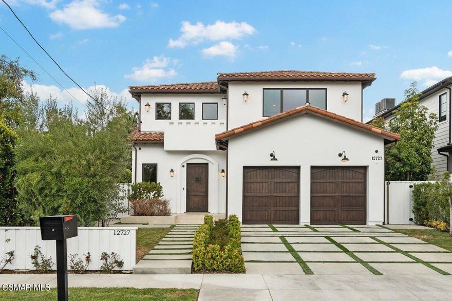 Welcome to 12727 Landale Street, a spectacular rental estate home near Beeman Park. This is a two-story smart home with 6,000+ sq. ft. 5 bedrooms, 7 bathrooms that offers stunning architectural details & designer finishes throughout. Enter through a formal entry with soaring ceilings & a grand staircase into the living room with a fireplace that looks out to center courtyard. The gorgeous lighter wood flooring runs throughout the main rooms on both levels. Pass by the music room/library & elegant formal dining room into the open concept family room with built-ins, a wine room & fireplace.  The state-of-the-art chef's kitchen comes fully equipped with a Sub Zero fridge, 6 burner Wolf range, walk-in pantry & oversized center island. There also is a downstairs en-suite bedroom. Upstairs there are 4 en-suite large bedrooms. The impressive master suite has vaulted beamed ceilings, fireplace, fantastic walk-in closet, & views to the lush rear landscaping. The spa-like bathroom features a oversized shower & soaking tub. An added bonus is the upstairs gathering room with high beamed ceilings, a balcony & built-in desk. The spacious Entertainers backyard has a pool & spa, built-in BBQ, & large grassy area and plenty of patio space to spread out. Near Ventura Blvd's shopping, dining, coveted schools and so much more. The staged furniture has been removed since these photos were taken. A very special place to call home awaits.