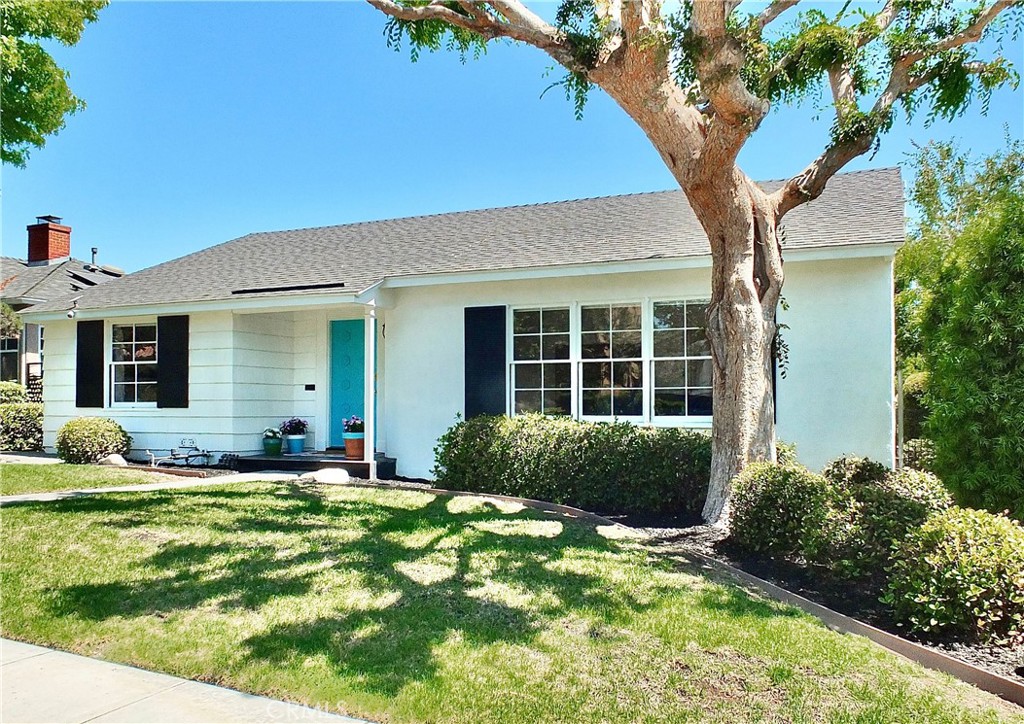 Located in the Coastal Long Beach neighborhood of Belmont Heights, this beautiful 1950 Mid Century home is a treasure in its vintage beauty, yet it feels fresh and new! Slate floor entry greats you with a quaint overhead chandelier light fixture. Spacious living area, with beautifully refinished original oak wood floors, and lots of natural light. 2 Oversized bedrooms. Nice sized dining room is ideally located in-between the kitchen and spacious living room which makes entertaining a breeze. Vintage vibes and classic character come forward in the original hardwood floors, built-in cabinets, and turquoise kitchen appliances which were the norm in 1950. Dining area and Kitchen overlook lovely large yard. Brick Paver Patio in rear yard off screened in back porch. Detached 2 car garage off the alley with room to park 2 additional cars on the garage apron. Washer and Dryer hookups located in the garage. Home is ideally located just blocks from the ocean and walking distance to trendy restaurants & shops in the beautiful surrounding neighborhoods of both Belmont Heights and Belmont Shore. Upgrades include: Programable digital front & rear door kwick-set door locks. Newer Tankless Hot Water Heater. Newer Central AC installed 2022 with FAU relocated to the Attic and a NEST thermostat. Main electrical panel upgraded to 200 amps in 2022 - and nicely labeled:) Newer Bosch Dishwasher. New Kitchen Sink Faucet and newer Insinkerator disposal. Automatic yard sprinklers front and rear. Desirable Belmont Heights location with great walkability. Turnkey and Move-in Ready! Full size 50 x 130 lot (6500 sq ft) with ADU possibilities. The owner has preliminary architect plans for an ADU over the garage for anyone looking to expand this magical dwelling…