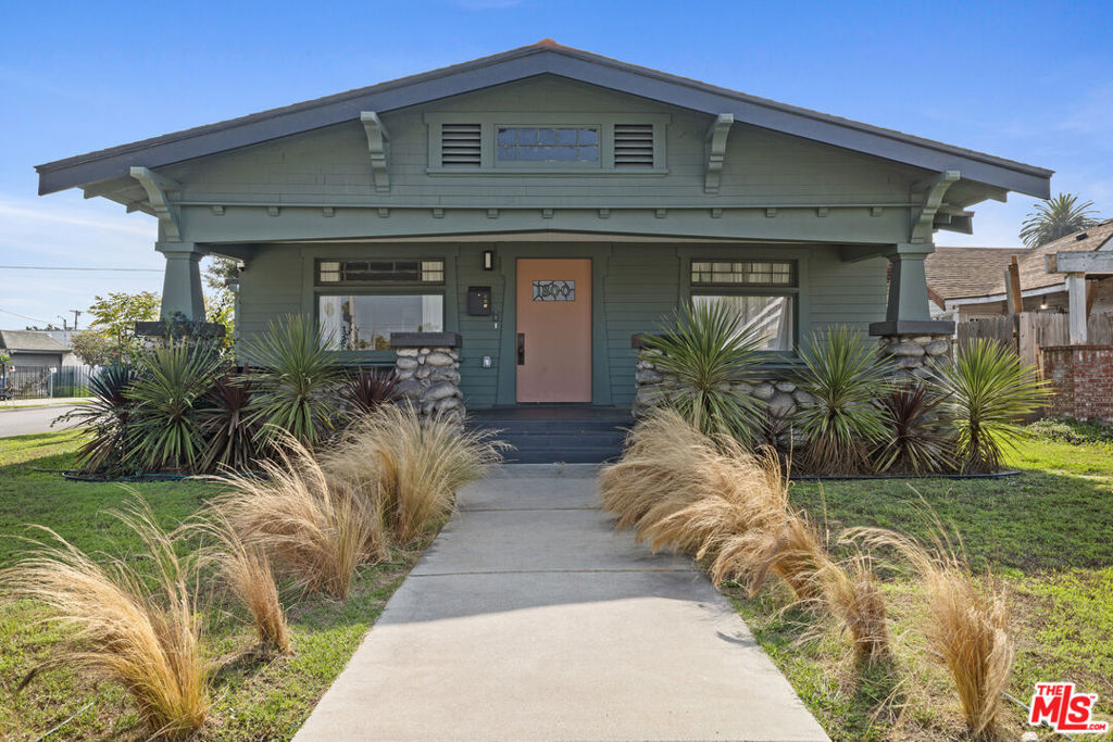 Welcome to this stunning 2023 renovated Craftsman, set on a picturesque tree-lined corner lot. Blending historic character with modern updates, this home showcases authentic Craftsman details including original coffered ceilings, classic moldings, and refinished hardwood floors that highlight its rich heritage.The open and flowing living and dining rooms create an inviting atmosphere, while the updated kitchen and bathrooms offer modern comfort and design. The home features three bedrooms, including a flexible space ideal for a home office or guest room, complete with a Murphy bed for convenience. Outside, the detached garage has been updated with electrical and its own HVAC system perfect for a creative studio, guest suite, or private workspace. Recent upgrades include a new roof and a brand-new central HVAC system, plumbing, and electrical ensuring peace of mind for years to come. Ideally located, this property offers easy access to Culver City and the Westside, while also being just a short drive to Downtown LA. Enjoy the best of Los Angeles living close to top dining, shopping, and cultural destinations while nestled in a serene neighborhood full of character and charm. Discover the perfect balance of classic craftsmanship, thoughtful renovation, and unbeatable location in this exceptional Craftsman home.