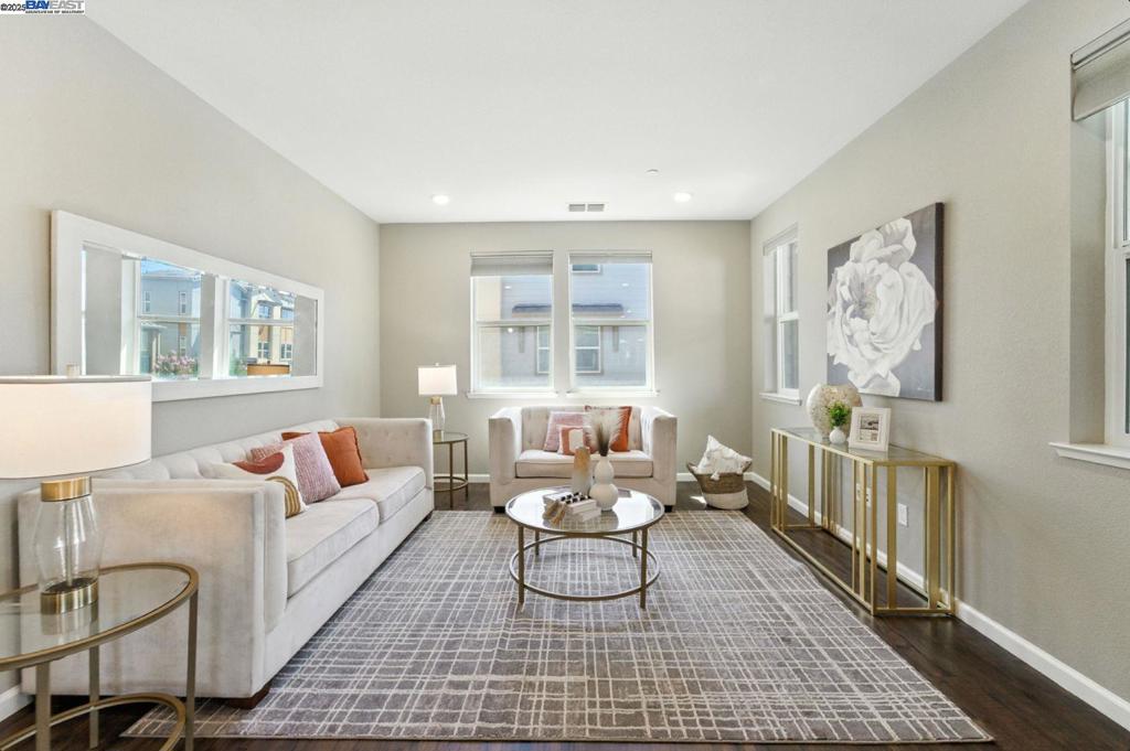 Location! Location! Location! Welcome to NE facing Premium End unit Town home with over $100K in upgrades nestled in award winning Milpitas school community. This beautiful 4bd/3.5bth home has functional floor plan with 1bd/1bth downstairs. The home has luxurious waterproof laminate flooring thru out living room, formal dining room and kitchen. Fresh new paint thru out the home. This home has customized kitchen with Caesarstone quartz counter top and SST appliances...it is truly cooks delightful kitchen. The master bedroom suite is spacious with organized walking closet, standing shower, and double sink vanity in the bathroom. Two additional bedrooms upstairs are spacious to hold a full size bed as well as desk with fully upgraded bathroom. The bedroom downstairs is perfect for any guest and has fully upgraded bathroom. This home has plenty of storage thru out the home. The outside patio on the second floor is great for morning coffee or evening relaxation. This home is closer to kids area and picnic area. This home has great walking score to BAPS Temple, Shirdi Sai Parivaar Temple, easy access to nearby tech companies, BART station, Parks, Great Mall, restaurants, and freeways like 880, 237, and 680. This is a MUST SEE home for its customized beauty and calm location.