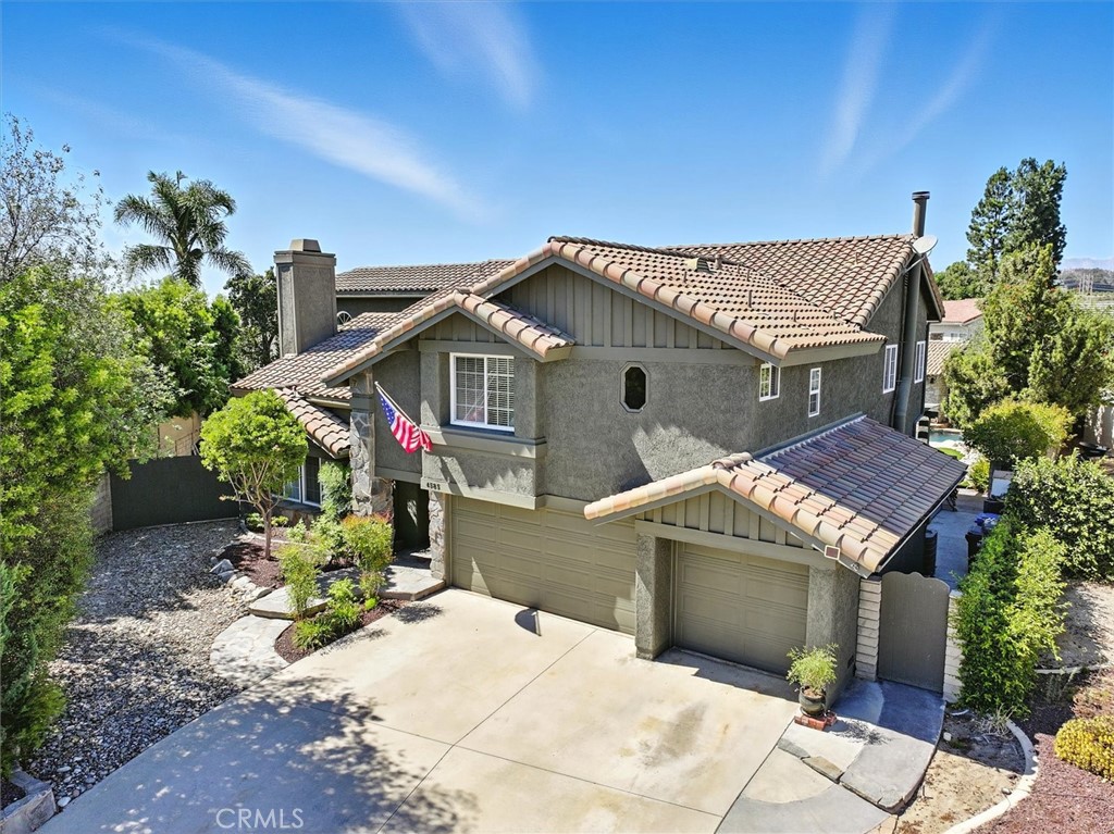 Just when you think you have seen it all, this house is a home straight from the pages of Homes and Better Gardens.... This beautiful Moorpark house is located in a quiet CUL-DE-SAC nestled in the safest large County of Ventura California with NO HOA- FEES, COPPER PLUMBING , NEWER ROOF. and so much more. An upscale spacious 4,056 square foot home has so much to offer..... a light filled loft greeting your view at entrance from the foyer as your eyes gaze up to the high beamed ceiling. There are many upgrades in this creative home with the ability to have a separate complete oasis that can be closed off for an independent living and ability to function like your own private ADU. This spawning home has 5 bedrooms that could easily be turned into 6 bedrooms, depending on what you choose to do with the space, two being large masters, and 4 1/2 baths. The living room area and family gathering room both having beautiful fireplaces. The kitchen fully equipped with high end appliances like WOLF stove and and dining room add to the popular open concept mingling from one space to another. An entertainment room and study make this home a must, not leaving anything to the imagination. The outside property has a three car garage and RV access. This European inspired back yard has a beautifully customized saltwater pool with a custom authentic rock waterfall, spa, pool house with cozy fireplace and TV great for entertaining or enjoying a relaxing evening by the fire with covered patio attached. There is a large patio extending the length of the home with seating lounge space, barbecue area,and outdoor dining under a beautiful custom attached gazebo. A truly wonderful home close to great schools, shopping, dining, and the historical quaint town of Moorpark for weekend strolls.