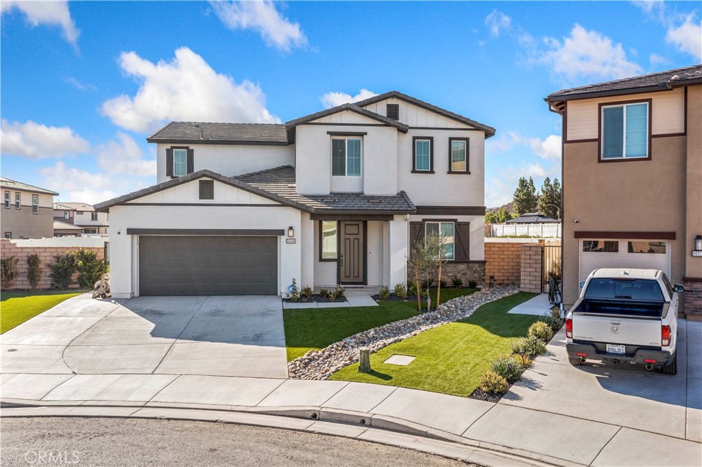 This beautifully upgraded cul-de-sac home offers 5 bedrooms, 3 full bathrooms, a spacious loft, and a dedicated bonus room, ideal for remote work, playroom, or home gym. With over 3,000sqft of open living space, it blends modern style with functionality. Step inside to light luxury vinyl plank floors, wide hallways, and an open-concept design that flows from the great room into the dining area and chef’s kitchen. The kitchen features granite countertops, white shaker cabinets, stainless steel appliances, a walk-in pantry, and a large island with pendant lighting and bar seating, perfect for gatherings. Downstairs offers a full bedroom and bathroom, while upstairs features a large loft, full laundry room with storage, and four additional bedrooms. The primary suite is a private retreat with a spacious layout, spa-like bath, dual sinks, walk-in shower, vanity area, and a large walk-in closet. The backyard is an entertainer’s dream with one of the largest lots in the neighborhood. It features a concrete patio, new sod lawn, fire pit area, and low-maintenance landscaping. Enjoy privacy and room to relax or entertain. Additional features include: Bonus room on main level, Tankless water heater, Energy-efficient features, Recessed lighting, Ceiling fans throughout, and 3-car attached garage Located in a quiet, desirable neighborhood close to parks, shopping, and schools, this turnkey home checks all the boxes. Don’t miss your chance! schedule your tour today!