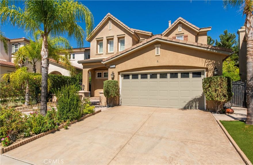 Welcome to this beautifully updated 4-bedroom, 3-bathroom home located in the highly sought-after gated Sorrento Meadows Community of Porter Ranch.



As you enter, you’re greeted by soaring high ceilings and an abundance of natural light, creating a bright and inviting atmosphere. The spacious kitchen boasts a large center island that opens seamlessly to the family room and breakfast nook—perfect for entertaining and everyday living.



This thoughtfully designed floor plan features a convenient downstairs bedroom and full bath, ideal for guests or a home office. Upstairs, you’ll find newly installed flooring, a laundry room for added convenience, and generously sized bedrooms—all with walk-in closets. The primary suite is a true retreat, offering a spa-like bathroom with soaking tub, separate shower, and dual vanities.



Additional highlights include a 3-car tandem garage, brand-new toilets throughout, and a large backyard with a built in counter with sink and BBQ offering endless possibilities for outdoor enjoyment.



Located within the award-winning Porter Ranch school district and just minutes from shopping, dining, and easy freeway access, this home perfectly blends comfort, style, and convenience.