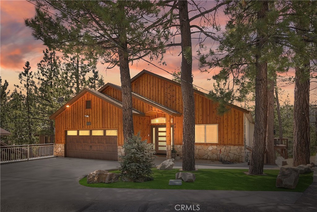 39080 Waterview Drive, Big Bear Lake, CA 92315
New Price: (Reduced by $50,000)
4 Bed • 3 Bath • 3,698 sq ft • Built 2009
Experience the best of mountain living at 39080 Waterview Drive, a stunning lake view home for sale in Big Bear Lake, California. While not directly on the waterfront, this custom-designed home captures the essence of lakefront living with breathtaking panoramic views that stretch over the pines and toward Big Bear Lake.
Inside, the home offers 3,698 square feet of beautifully designed space featuring vaulted ceilings, rich wood finishes, and walls of windows that flood the home with natural light. The heart of the home is a chef-inspired kitchen with quartz countertops, custom maple cabinetry, and stainless steel appliances—perfect for hosting or everyday living.
The main-level primary suite includes a spa-style bathroom, walk-in closet, and private deck access. A versatile downstairs bonus room can serve as a game room, guest quarters, or home office. Additional highlights include central air conditioning, forced air heating, an epoxy-finished garage, and a large driveway with ample parking.
Located just a short drive from Snow Summit, Bear Mountain, Big Bear Lake Village, and the marina, this home is a perfect choice for a full-time residence, vacation getaway, or short-term rental investment.