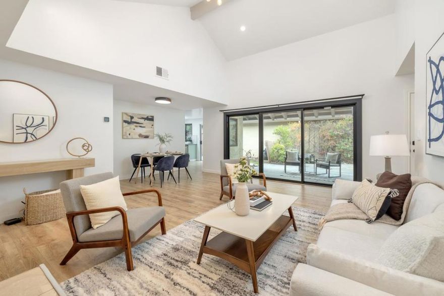 Welcome to this beautifully updated single-story home in the heart of San Jose, featuring 1,260 sq. ft. of living space with 3 bedrooms and 2 bathrooms including a fully renovated hall bathroom. Over $100K in upgrades in the past 2.5 years include a stunning kitchen with quartz countertops, new cabinets, and stainless steel appliances. Additional updates feature new LVP flooring, fresh interior paint, modern lighting with Wi-Fi controlled switches, and a smart doorbell. The home also offers a new HVAC system (June 2023), nearly all new windows, doors, and sliders, plus a stylish accent wall in the primary suite. Enjoy abundant natural light from a skylight, central heating and AC, plus a 2-car garage with laundry, and 220V EV hookup in garage. The backyard retreat includes new turf, updated exterior lighting, a tranquil Buddha fountain, and fruit trees including lemon and persimmon perfect for entertaining or relaxation. Nestled in a friendly neighborhood with nearby parks, shopping, dining, and convenient freeway access, this property provides both comfort and connectivity. Located in the desirable Berryessa Union School District, this move-in ready home combines modern upgrades, efficiency, and style, an excellent opportunity for those seeking quality living in Silicon Valley.