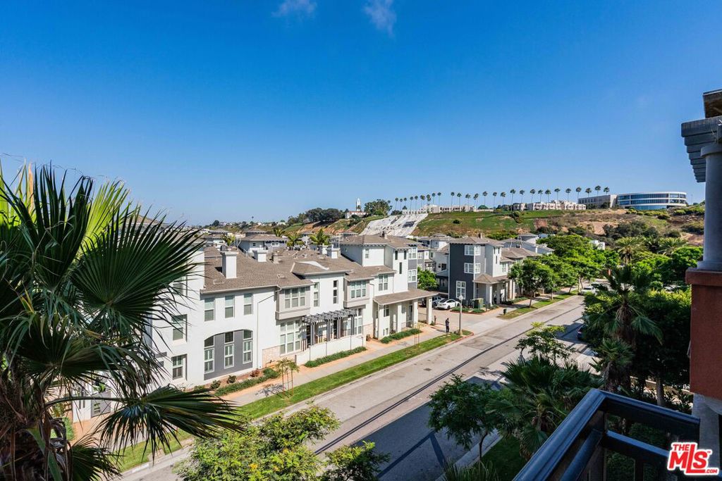 Come see this 4th story condo with stunning bluff and city views! Located in the Tempo complex, central to all of Playa Vista, this top floor one bedroom and one bath condo features an open floor plan with a bonus office nook, perfect for those who need a space to work from home, and has only one shared wall. The kitchen features stainless steel appliances and opens onto the living area and private balcony. The bedroom is light and bright with a walk-in closet and custom built-ins. This home includes a large stack-able washer/dryer, and 2 parking spots. Located next to concert park, the hub of summertime community activities. Enjoy the convenience of local favorite restaurants, hangouts, and services just outside your door. Playa Vista amenities include cable, hi-speed internet, Jr. Olympic size pool, fitness center, CenterPointe Club & Resort access, conference room, screening room, public library & parks, and top-rated elementary school. Currently tenant occupied but can vacate with 2 weeks notice. Animals will be considered.