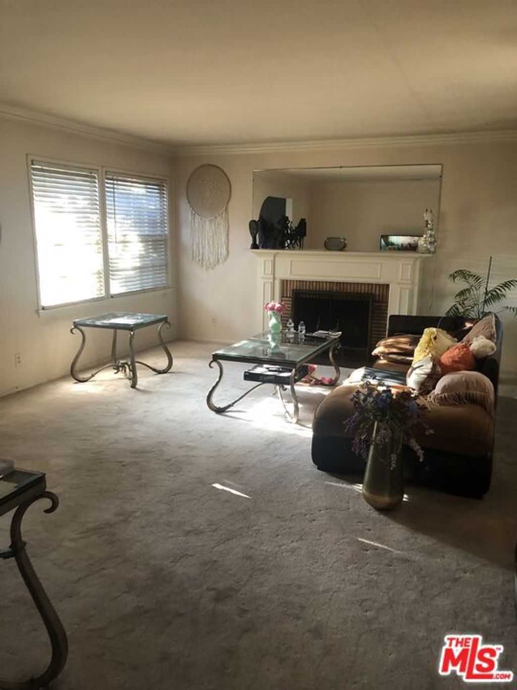 Photo of 3692 Buckingham Road, Los Angeles, CA 90016 (MLS # 25592639)