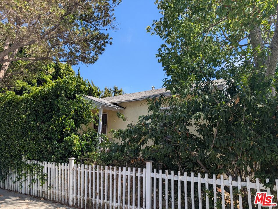 Fixer or Development Opportunity in Santa Monica! Don't miss this incredible chance to own in Santa Monica. This versatile property features a detached 3-bedroom, 2-bathroom front house and a vacant 3-bedroom, 2-bathroom rear unit with a den, ideal for renovation, redevelopment, or income generation. The front house is currently occupied, offering immediate rental income potential, while the rear unit is vacant and ready for improvement. Just one block from the train station and offering easy access to the 10 Freeway, this property is perfect for an owner-user or investor looking to capitalize on location, layout, and upside potential. Live in one unit and rent out the other, or re-imagine the entire property to suit your vision. A rare find with outstanding potential in the heart of Santa Monica! Both the front house and the rear unit have a non-conforming bedroom and bathroom. Title shows as an SFR.