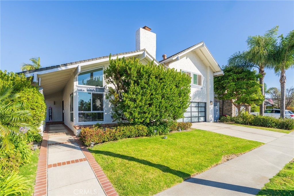 Ideally situated in one of Huntington Harbour’s most sought-after locations, Humboldt Island, this beautifully updated home offers the perfect blend of comfort, space, and indoor-outdoor living. As you enter through the front door, you’re greeted by an open-concept living and dining area filled with natural light and anchored by an updated white kitchen that flows seamlessly into a cozy den. Sliding doors off the den lead to a spacious backyard oasis—complete with a sparkling pool and spa, perfect for entertaining or relaxing year-round.
The thoughtful floor plan includes a downstairs primary suite featuring a massive walk-in closet, along with a second bedroom on the main level—ideal for guests or a home office. Upstairs, you’ll find three additional bedrooms and a full bathroom, providing plenty of room for family, guests, or a home gym. 5 bedrooms total!
Welcome to the secret oasis of Huntington Harbour where boating, watersports, yacht clubs abound. So many clubs and fun events including the Philharmonic Holiday boat parade. Take your Duffy boat out to many restaurants with public docks, paddle board for fun, bike to the beach or downtown HB, Surf City, HB pier and the HB Air Show.