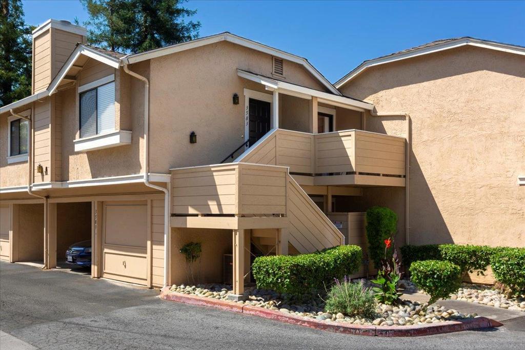 Experience the best of Silicon Valley living in this stunning single-level end unit. Enjoy the luxury of having a private garage beneath and no neighbors above or below. The kitchen and bath shine with new quartz countertops, new modern lighting & plumbing fixtures. Cook and entertain with ease using new stainless steel appliances, including a sleek French door refrigerator. Throughout the home, new waterproof LVP flooring and fresh paint create a polished, contemporary look. The open floor plan and vaulted popcorn-free ceilings enhance the home's spacious, airy ambiance. Cozy up to the fireplace during cooler months and savor sunny mornings on your private deck. Central heating and air conditioning ensure comfort all year round. You'll appreciate the indoor laundry room w/ a full-size washer and dryer. Located on the second floor, this unit offers an added layer of privacy and security. Nestled in the desirable Berryessa area w/ great schools and nearby parks, trails, shopping & dining. Convenient access to the 680 freeway & BART for commuters. Excellent opportunity for first-time buyers, investors, down-sizers, professionals needing a part-time spot in Silicon Valley for in-office days, or anyone wanting a low maintenance home with comfort and style.