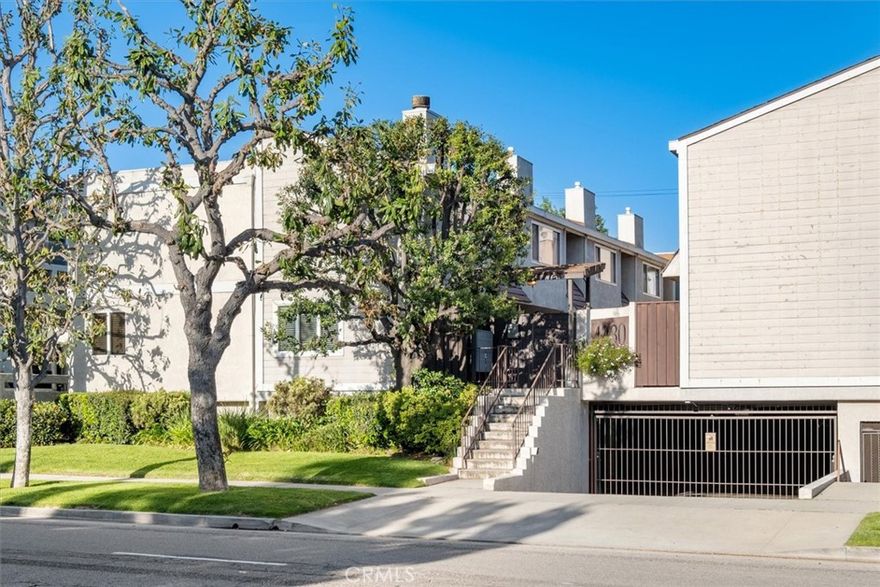 Beautifully upgraded townhouse-style unit in an intimate 11-residence complex, ideally located in Studio City. This spacious and light-filled home features 2 bedrooms and 2.5 bathrooms. The entry opens to a generous living room with gleaming Brazilian Pecan flooring. Just off the living room, enjoy your own private patio. The kitchen offers ample granite counter space and freshly painted cabinetry. Stainless steel refrigerator and side by side washer & dryer are included.  A stylishly renovated powder room completes the first level. The upper level features a spacious primary bedroom with soaring wood-beamed ceilings, ample closet space, and a upgraded en-suite bath with dual vanities. The additional bedroom also includes its own en-suite bath. A generous built-in linen closet lines the hallway. Enjoy parking for two cars in a secure, gated garage that also offers extra storage. Located in the desirable Carpenter School District and just moments from Ventura Boulevard, residents can explore the Shops at Sportsmen's Lodge, Erewhon, Equinox, and a variety of acclaimed restaurants. The renowned Studio City Farmers Market is just minutes away. Upgrades include newer AC and heating systems, updated windows and sliding glass door, and recently redone flat roof sections. The HOA provides earthquake insurance, and this smaller, pet-friendly complex also features a refreshing pool. A wonderful place to call home!