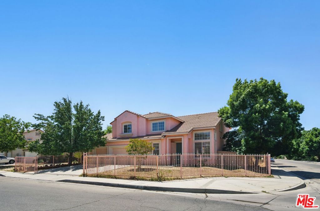 HUGE light & bright 5bed/3bath 3200sq feet updated gated home with a 3-car direct access garage and a large backyard. As you enter the home, there is a spacious living room with high ceilings and an additional room/office. The main floor features an open floor plan with a big dining area and large kitchen, with lots of cabinets, a walk-in pantry and all new stainless steel appliances. Off the kitchen is a laundry room, one bedroom and a bathroom with tub & shower and direct access to the huge three car garage. Upstairs is a large family room with a built-in desk and four bedrooms. The primary bedroom has an ensuite bathroom with separate tub & shower and a very large walk-in closet. There is another bathroom with tub & shower upstairs off the family room. Other features include central AC and a big backyard with access from the kitchen & dining area. PET FRIENDLY.
