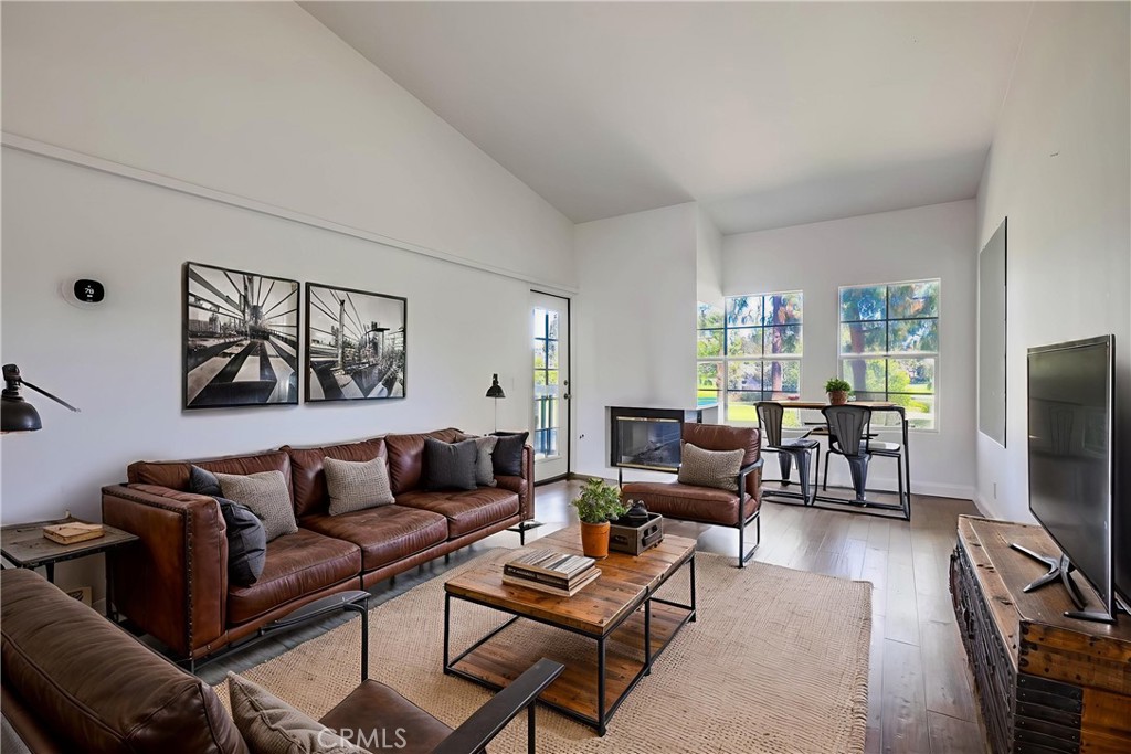 Welcome to 67 Via Pausa, a beautifully updated upper-level condo nestled in a tranquil, private pocket of Rancho Santa Margarita. Located in a charming courtyard-style setting, this home offers a peaceful front approach with paved walkways and lush greenery that create a serene first impression.
Inside, you’re greeted by a stylish bathroom to the left—featuring elegant grey marble stone accents and a true in-home steam sauna shower, complete with a glass enclosure, ceiling-mounted rainfall showerhead, and a pebble-tiled floor. A unique diagonal vanity finished in warm light wood tones completes the space.
The space then opens into a bright, spacious living room filled with natural light, anchored by a cozy fireplace, with large windows and direct access to a private balcony. The adjacent kitchen has been updated with sleek quartz countertops, modern appliances, a large farmhouse-style sink, soft-close drawers, and crisp white cabinetry, creating a bright and functional workspace with ample storage.
The generously sized bedroom offers a peaceful retreat with mirrored sliding closet doors and its own access to the balcony. The private balcony is a true highlight, offering a panoramic view of the lush golf course, a sparkling lake, and mature trees.
Additional conveniences include a stackable washer/dryer unit and a detached garage providing secure parking and extra storage. Residents of this vibrant community enjoy access to outstanding amenities, including a beach club, 13 parks, multiple community pools, sports courts, and extensive hiking and biking trails—along with highly rated nearby schools.
67 Via Pausa combines modern updates, abundant natural light, and sweeping views in a serene community setting. Move-in ready and full of charm, this home offers an ideal blend of comfort, style, and lifestyle in highly desirable Rancho Santa Margarita.