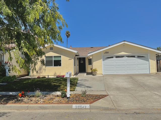 Welcome to this charming 4-bedroom, 3-bathroom home located in the vibrant city of Fremont. The spacious eat-in kitchen is equipped with modern amenities, including a 220 Volt Outlet, quartz countertops, and a range hood, making it ideal for culinary enthusiasts. The home features various flooring options such as laminate, tile, and wood, adding warmth and elegance throughout. With high ceilings, skylights, and a security gate, the property offers a sense of openness and security. The laundry area is conveniently situated for easy access. The house falls under the Fremont Unified School District. Energy-efficient features include a tankless water heater and a thermostat controller, ensuring comfort while minimizing energy costs. Complete with a 2-car garage, this home is perfectly suited for comfortable living in a desirable location.