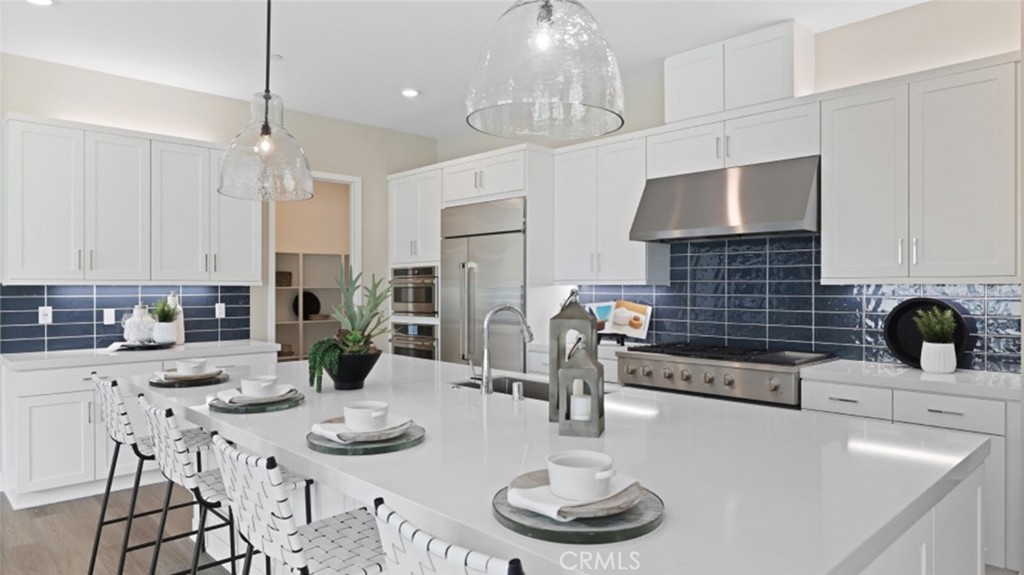 Set within a 55+ community, this single-level home features a generous open floorplan shared between the family room, kitchen and dining room. Stackable sliding glass doors lead to the California Room for effortless indoor-outdoor living and entertaining. The owner’s suite enjoys a private location at the back of the home, while two secondary bedrooms are comfortable retreats.