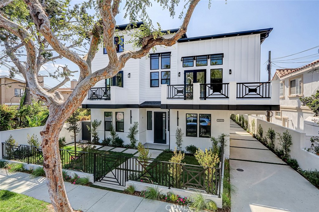 Welcome to 2604 Grant Ave #A, Redondo Beach — a beautifully crafted, modern coastal home offering style, comfort, and smart living. This newly constructed residence is one of three luxury townhomes designed with thoughtful features and high-end finishes throughout. Unit A stands out with its private yard, stained exposed beams, vaulted ceilings, as well as a mezzanine giving it a spacious, airy feel. Inside, you’ll find scratch-resistant and waterproof flooring throughout — ideal for families, pets, and carefree living. The open-concept kitchen boasts under-cabinet lighting, a farmhouse sink, gas stove and oven, microwave, dishwasher, refrigerator, and a sleek electric exhaust hood. Custom touches like backlit crown molding, a chandelier over the staircase, and mirrors pre-installed in every bathroom elevate the interior aesthetic. The primary suite features a large ceiling fan, Jack and Jill sinks, a standalone soaking tub, and a luxurious rain shower head. Every bedroom is pre-wired for wall-mounted TVs and ceiling fan installation, while the home is climate-controlled with a Nest thermostat system connected via WiFi for seamless temperature management. Enjoy cozy nights with remote-start gas fireplaces and entertainment-ready spaces including a large flat-screen TV already installed. The roof deck is fully prepped with gas lines, sink, and electrical for a future grill or firepit, making it the perfect spot for sunset gatherings. This unit includes a 2-car garage plus additional covered parking, Ring camera system, EV charger-ready outlet, automatic garage door opener, and dedicated washer/dryer room ready for your appliances. The property also offers a sump pump with backup, gas water heater, fire sprinkler system, and comprehensive smoke and carbon monoxide detectors for peace of mind. Outside, you’ll find automatic driveway lighting, turf inserts for curb appeal, drip and sprinkler systems with separate timers and bells, exterior electrical plugs, and minimized HOA fees thanks to efficient planning. Located in desirable North Redondo Beach, close to shops, restaurants, parks, and just minutes from the beach — 2604 Grant Ave #A is more than a home, it's a lifestyle. Don't miss this opportunity to own a turn-key modern masterpiece in one of the South Bay’s most sought-after neighborhoods!