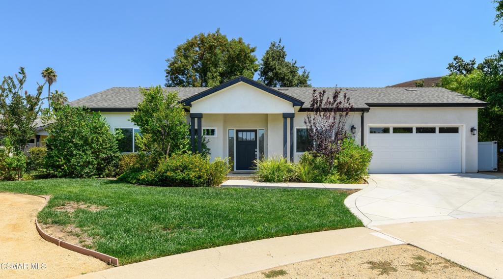 Two Homes in One - Stylishly Upgraded and Solar-Powered! Discover this exceptional property in Thousand Oaks featuring a modern single-story main home and a fully detached ADU--perfect for extended family, guests, or income potential. The main home spans approximately 1,848 sq ft with 3 spacious bedrooms and 2 full bathrooms. Designed with clean lines and open-concept living, it showcases a grand great room with vaulted ceilings, lots of natural light, and a designer kitchen complete with a massive quartz-topped center island, stainless steel appliances, self-closing cabinetry, and sleek overhead lighting. Wood-look porcelain tile flows throughout--no carpet anywhere--enhancing both style and durability. The primary suite offers dual closets and a beautifully appointed en-suite bath. Additional upgrades include oversized baseboards, three-panel interior doors, brushed nickel hardware, and LED lighting in every room. The detached ADU (approx. 600 sq ft) includes 1 bedroom, 1 full bath, and its own private yard. With finishes matching the main home, it's ideal for an independent family member, guest quarters, or rental income. Both residences include owned solar, and there's room for an RV or boat. This is a rare opportunity to own a modern, move-in ready compound in a desirable Thousand Oaks neighborhood!