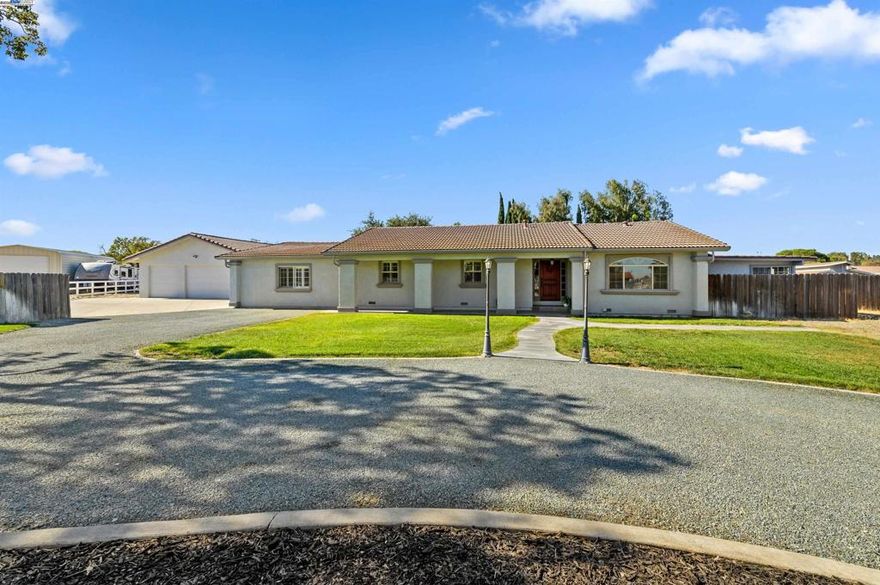 Live, Rent, Earn. Unlock the income potential of this multi-functional ranch property located in the desirable Santos Ranch area of Tracy. The primary residence features 6 bedrooms, 3 bathrooms and flexible living spaces, including an office and fitness/bonus room. The updated detached ADU offers a stylish, private space perfect for rental income, in-law living or Airbnb. Horse-friendly zoning and a 6-stall barn with pasture create added income possibilities through boarding or hobby farming. With gated access, a 3-car garage, well, septic utilities and solar, this property is not only secure and self-sustaining- it's a smart long-term investment. Live in one unit and rent the other, let your land work for you. located just minutes from schools and shopping but with wide-open skies, this is country living made easy!