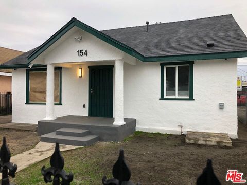 Photo of 154 W 93rd Street, Los Angeles, CA 90003 (MLS # 25630801)