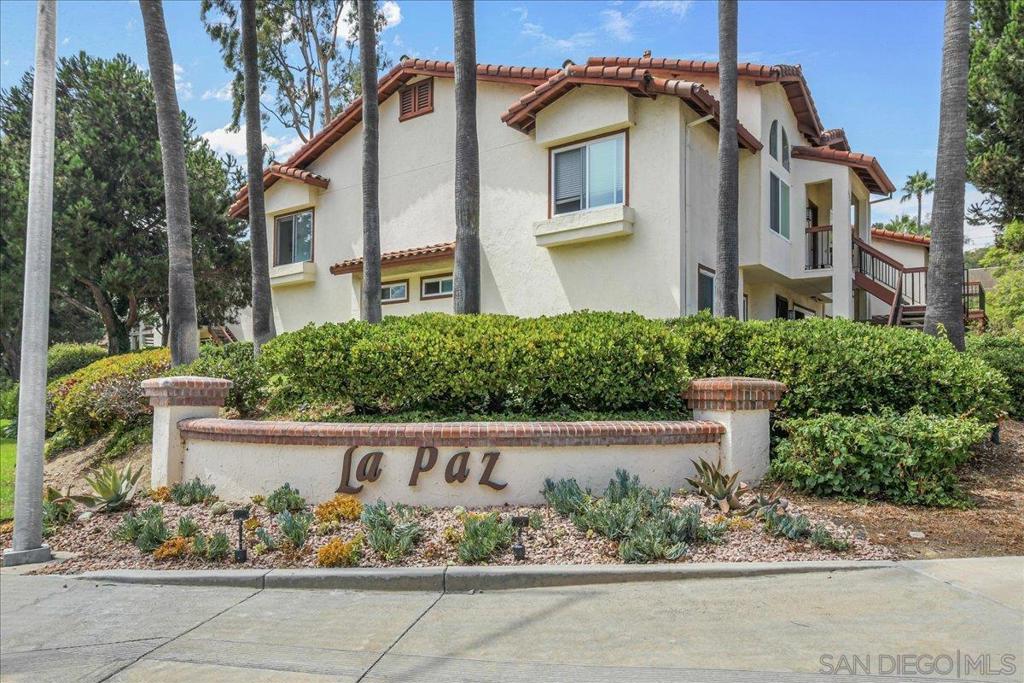 Charming 2 bedroom 2 bath 966 square foot move in ready condo in the lovely community of La Paz in La Jolla Colony. Fantastic location Upper unit with fresh coastal breeze! Upgrades include NEW interior paint throughout, popcorn ceilings removed and retextured, stainless steel appliances, granite counters in Kitchen, and laminate wood flooring. Primary bedroom has large walk in closet. Full size washer & dryer in unit with 2 assigned carport parking spaces. NEW balcony to enjoy your morning coffee or tea. HOA includes a community pool and spa, water, trash, exterior building maintenance and community landscaping. Walking distance to beautiful and serene La Jolla Colony park designed with walking trails and perfect for picnics. La Paz is a spectacular location centrally located and minutes to I-5, La Jolla beaches, UTC Mall, Vons Grocery, coffee shops and Leucadia Pizzeria.