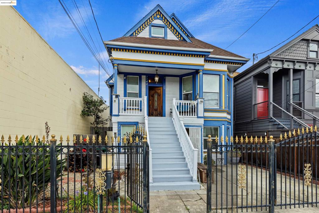 Discover the perfect mix of historic charm and contemporary updates in this West Oakland Victorian duplex. Both units are vacant, presenting an excellent opportunity for owner-occupants seeking a house hack or investors looking for income-generating potential. The upstairs unit features high ceilings, warm wood floors, a formal dining room, and a fully updated kitchen. The lower unit offers 3 bedrooms, 1 full bath, and a beautifully updated kitchen and bathroom. Each unit has its own laundry, ensuring privacy and convenience for residents. Enjoy the spacious backyard with fruit-bearing peach and lemon trees, ideal for gardening or outdoor gatherings. The property is fully gated with off-street parking, enhancing security and ease of living. Located in a thriving West Oakland neighborhood, commuters benefit from easy access to HWY 880/80/580 and the West Oakland BART Station. Don’t miss this rare opportunity to invest in a property that combines character, functionality, and the vibrant energy of West Oakland.