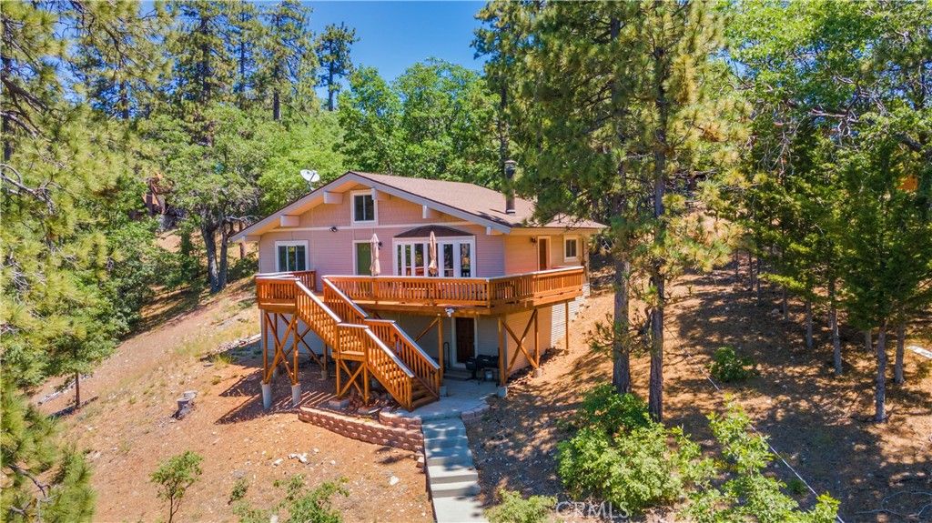 Photo of 39576 Oak Glen Road, Fawnskin, CA 92333 (MLS # IG26085930)