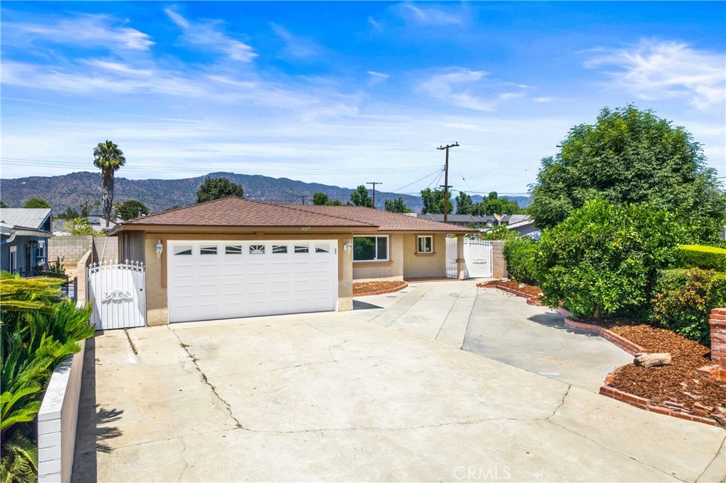 Welcome to 937 E Haltern St, Azusa, CA 91702 — a beautifully updated single-story home tucked away in a quiet cul-de-sac, just minutes from Azusa Pacific University and surrounded by local shops, restaurants, and conveniences.
Step inside to an open floor plan featuring brand-new tile flooring, fresh paint, crown molding, and baseboards throughout. The spacious kitchen is outfitted with rich brown cabinetry, stainless steel hardware, and ample storage — perfect for both daily living and entertaining.
This 5-bedroom, 2-bath home includes a generous bonus room that can be used as a second living space, home office, or playroom. New double-pane windows provide energy efficiency and natural light throughout. The home also features central air and heat, with two of the bedrooms equipped with their own mini-split units for added comfort.
The primary bathroom showcases a beautifully tiled walk-in shower and modern single-sink vanity, while the second bathroom features a tiled shower/tub combo with clean finishes.
The large, private backyard is drought-tolerant and low maintenance, secured with iron side gates. The oversized concrete driveway accommodates up to 6 vehicles, and the attached 2-car garage features a brand-new automatic garage door opener and convenient outside access. Washer and dryer hookups are also located in the garage for easy laundry setup.
Additional highlights include:
• New roof
• New ceiling fans and updated lighting throughout
• Energy-efficient windows
• Quiet neighborhood near schools, parks, and public transit
Don't miss this opportunity to lease a freshly renovated, move-in-ready home in one of Azusa’s most desirable pockets.