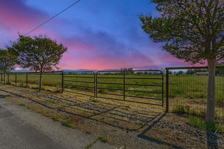 Just Listed : Stunning 5 acre lot in North County off Comstock Road.. Discover the perfect opportunity to build your dream home on this stunning 5-acre lot in Hollister's sought-after North County. Offering privacy, tranquility, and breathtaking country views, this spacious lot is ideal for creating your own sanctuary. Imagine a custom-built residence or a peaceful retreat in a serene rural setting, just minutes from town. Don't miss your chance to own a piece of North County's beautiful landscape and make your countryside living dreams a reality! Located in the Ausaymas Valley, this lot sits on a plateau above Santa Clara Valley, just 7 miles from Hollister. The plateau provides a unique microclimate and great views of the valley below, nestled behind the Three Sisters Peaks of the Diablo Range. These lots are practically "Build Ready" with approved building and septic locations defined on the maps. PG&E is available at the property edge (Bluff Road), and irrigation water can be accessed by connecting to San Benito Water (blue valve) along Bluff Road. Domestic water will need to be provided by drilling a new well.