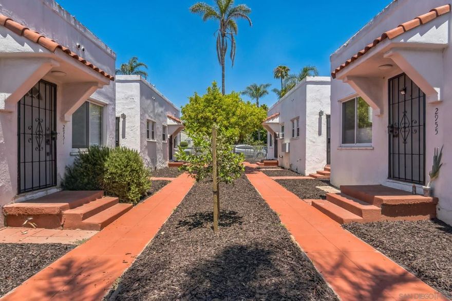 Presenting 2949–2957 Kalmia Street, a rare 8-unit Spanish-style bungalow court located between North Park and South Park, two of San Diego’s most desirable rental submarkets. This income-generating property features Five fully upgraded 2 bed/1 bath units, one 3 bed/2 bath unit and two newly constructed ADUs completed in 2025 — spacious 2 bed/2 bath, both featuring private yards. The bungalow court layout and lush landscaping provide excellent curb appeal and community charm. Situated on a large 10,679 sq ft lot with 4,136 sq ft of improvements, strong walkability to Target, Balboa Park, local cafes, and restaurants. Ideal for any investor seeking a stabilized, low-maintenance multifamily property in a premier San Diego location.  This exceptional 8-unit property is a fully stabilized Spanish-style bungalow court located in the heart of North Park/South Park, two of San Diego’s most sought-after rental neighborhoods. The unit mix includes six upgraded 2 bed / 1 bath units, one 2 bed / 2 bath ADU, and one 3 bed / 2 bath ADU. Both ADUs were newly constructed in 2023 with final permits and feature modern finishes, in-unit laundry, and private yards. These newer additions complement the charm of the original bungalow-style layout, enhancing the appeal for tenants and boosting long-term rental value.  The property sits on a large 10,679 sq ft lot with 4,136 sq ft of rentable living area, offering an excellent footprint for operations. The current scheduled gross annual income is $197,712.80, representing a 5.07% actual cap rate at list price. Tenants enjoy gated off-street parking and beautifully landscaped common areas. The location is highly walkable to Balboa Park, the San Diego Zoo, boutique coffee shops, breweries, and restaurants — making it one of the strongest rent-growth corridors in central San Diego.  Renovations to five of the original six units include updated kitchens, bathrooms, paint, flooring, and finishes. One unit has been professionally staged to showcase its rental potential. This property is ideal for a 1031 exchange investor, long-term buy-and-hold owner, or anyone seeking a turnkey cash-flowing asset in a high-demand urban core.  Additional documents available upon request include full rent roll, ADU permit history, and pro forma projections.
