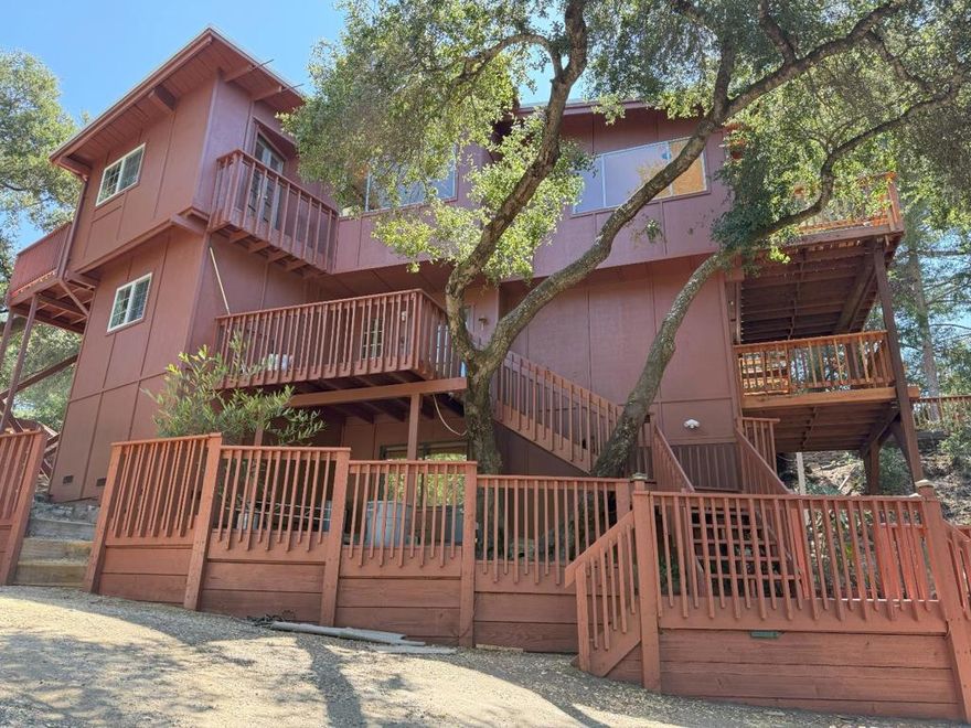 Welcome to this charming home located in the heart of Ben Lomond. The home boasts high ceilings and skylights, enhancing its spacious feel. This 1,711 sq ft residence offers three bedrooms and two full bathrooms, providing ample space for comfortable living. The primary suite is a true retreat, featuring a walk-in closet for your storage needs. The kitchen is well-equipped with a gas cooktop, built-in oven range, dishwasher, microwave, and a convenient pantry. It also includes tile countertops and an eat-in dining area, perfect for casual meals. Enjoy evenings outdoors with many sitting areas to choose from & take in the picturesque views. Additional features include a two-car garage and an existing shed for extra storage. Don't miss this opportunity to make this Ben Lomond gem your new home!