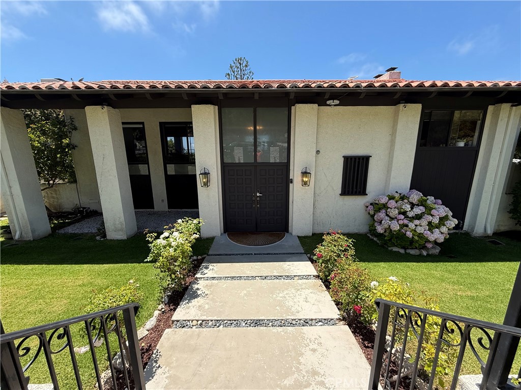 Welcome to 2801 Palos Verdes Drive West, a beautifully updated four bedroom, two and a half bathroom home where coastal charm meets modern comfort. From the moment you arrive, the circular driveway and inviting curb appeal welcome you inside. The open and airy layout features soaring vaulted ceilings and hardwood floors that flow through bright and spacious living and dining areas. The gourmet kitchen is a standout, complete with a professional Wolf range, Sub-Zero refrigerator, stone countertops, and custom cabinetry. Nearly every room opens to patios and ocean view decks, creating a natural connection between indoor and outdoor living. Step outside to your private backyard retreat with a sparkling pool, relaxing spa, and expansive deck space, all with stunning views of the Pacific Ocean. Whether you are entertaining friends or enjoying a quiet evening at home, the setting is truly one of a kind. Additional features include a three car garage, a cozy fireplace, and an ideal location just minutes from scenic bluffs, top rated schools, shops, restaurants, and the five star Terranea Resort. This home has been tastefully updated throughout and is ready for you to move in and start enjoying the best of Palos Verdes living.
