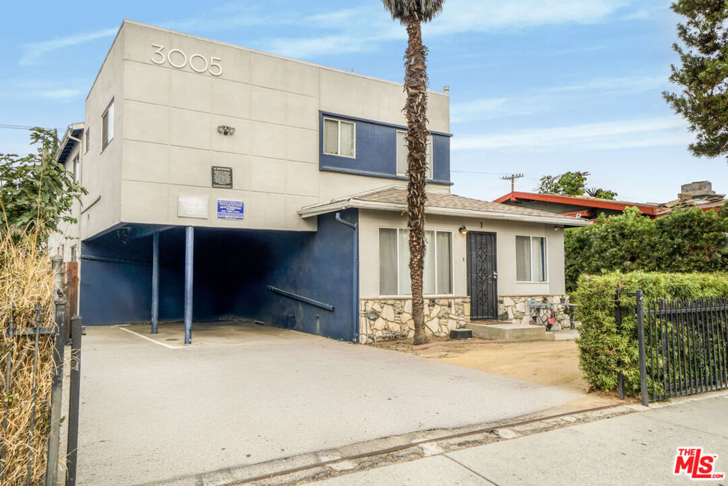 3005 S Normandie Ave | 8-Unit Multifamily in Adams-Normandie Near USC & Downtown LA. Built in 1960, the property features a balanced unit mix of (6) 1-Bed/1-Bath and (2) 2-Bed/1-Bath units totaling 4,837 SF on a 6,600 SF LAR3-zoned lot. Priced at $1,500,000 (~$187K per unit / $310 per SF), this offering presents investors with a strong blend of in-place income and meaningful upside through rent growth, light renovations, and operational improvements. The property currently achieves a 6.16% cap rate, with pro forma projections of 8.49%, driven by units renting well below market and one vacant unit ready to be repositioned. Several units are more than 200% under market rent, offering immediate potential to increase NOI and property value through rent adjustments and modernization. With nine on-site parking spaces, investors can also generate additional income through parking fees or RUBS implementation.