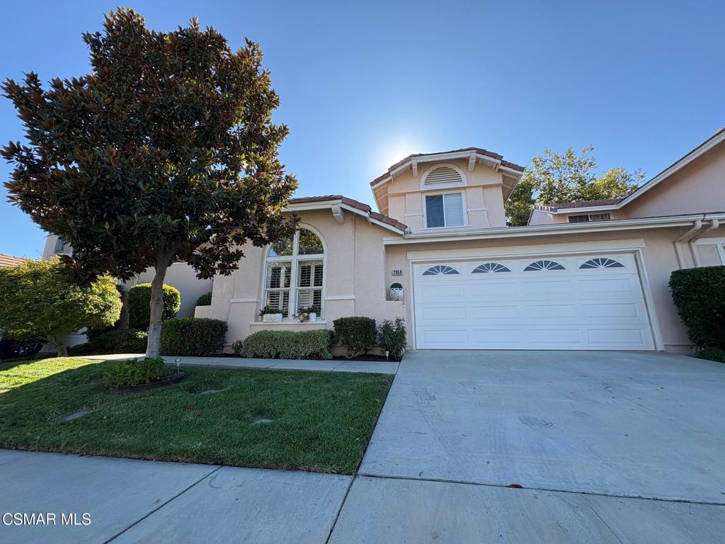 Captivating Find in the highly-desirable Casa Flores 55+ Gated Community with ideal location in the complex, directly across from the sparkling community pool and spa! Only one owner since originally built! Gorgeous two-bedroom, 2-1/2 bath with 1,494 square feet and every upgrade: Custom crown molding in living and dining areas, and the light and bright kitchen has been updated with granite kitchen countertops, pull-out shelves and upgraded appliances, including trash compactor. With direct-access from the convenient indoor laundry room, the finished two-car garage features epoxy flooring, built-in storage and work bench. The walk-in main closet provides ample storage with optimized designed, while all the dual-paned windows highlight custom plantation shutters and bespoke window coverings. Enjoy the gas fireplace on chilly nights, or the beautiful, professionally-landscaped backyard during the warmer months. Nothing to worry about with custom security doors and leaf-filter gutter guards in place, and the water heater newly-replaced in 2024. Casa Flores Community makes it easy to enjoy your new home as it also maintains the tranquil community park/picnic tables (under the oaks), and takes care of front yard landscaping, exterior building components (such as roof and painting). Freshly-painted interior and move-in ready!