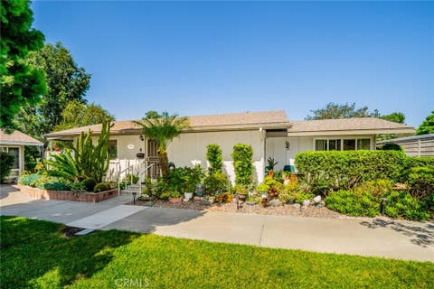 Photo of 510 Avenida Sevilla #A, Laguna Woods, CA 92637 (MLS # OC26097790)