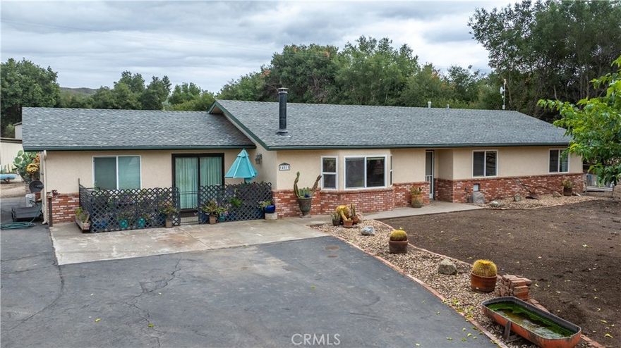 Ranch Style 3 bedroom 2 bathroom home set on 1.8 acres in desirable South Atascadero. This property has so much to offer including a large 40 x 60 shop, horse stalls with pipe fence runs, as well as two additional living areas. The property is fully enclosed with pipe fencing and features two access driveways both with automatic gates. 

The main home has 3 bedrooms and 2 bathrooms. The kitchen has granite counters, stainless steel appliances and a large bar counter perfect for entertaining. A sliding glass door leads to the back patio and yard from the dining area. Beautiful, engineered hardwood flooring is in most of the house. The large living area features vaulted ceilings, a bay window, and a cozy wood burning stove. The bedrooms are large with one having built ins for an office. The backyard is fully fenced and has a nice storage shed. 

Attached to the house is a 1 bedroom 3/4 bath guest unit. This can be accessed from the house or closed off and used separately. It has its own entrance both in the front of the home and to the backyard. The second guest unit located in the back side of the shop. This two story unit had 2 bedrooms upstairs, a full bath with laundry, living area and a kitchen downstairs. 

The very large shop has two roll up doors on the front and one on the back, this allows drive thru access on one side. This shop is perfect for a business, RV storage, car enthusiast, and more! The horse stalls are under a 20 x 60 overhang attached to the shop. This gives nice cover for the stalls and an isle way. All of the stalls have large pipe runs. There are also four paddocks in the front of the property and an unfenced arena area in the back. This property has so much to offer with potential for multi-generational living or rental income as well as plenty of room for your animals and projects!