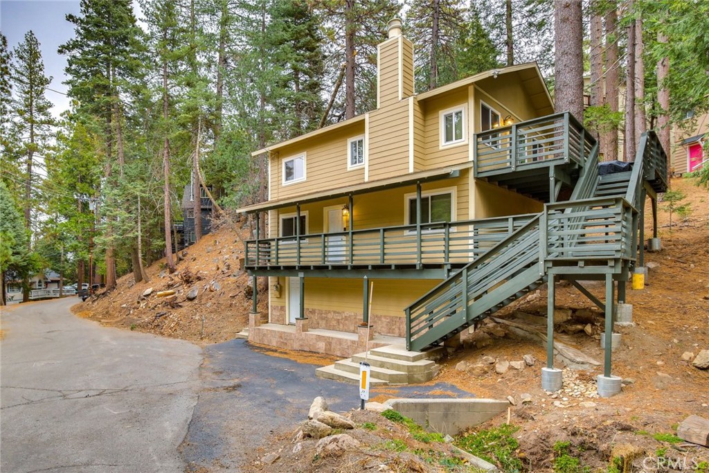 Charming Furnished 2-Story Cabin in Twin Peaks - AirBnB Income Opportunity!
Nestled in the serene woods of Twin Peaks, this beautifully remodeled 3-bedroom, 3-bathroom cabin offers an incredible opportunity for both personal enjoyment and income generation. With 1,175 SqFt of living space, this furnished home is fully equipped and ready to accommodate up to 8 guests — making it an ideal turn-key AirBnB investment.
Inside, you'll find an open and inviting floor plan featuring a bright living room with a cozy fireplace, a complete dining area, and a modern kitchen with appliances included. Recessed lighting, ceiling fans, and a brand-new heater add to the home’s comfort, while the convenience of an indoor laundry area (washer and dryer included) makes it even more practical.
Enjoy stunning views of the mountains, woods, and pine trees from every window or step out onto the spacious deck to breathe in the fresh mountain air. Entertainment amenities — including TVs, a Play Station for kids, BBQ, and security cameras — are all included in the sale along with stylish, newer furnishings.
This clean, well-maintained property is located in a highly desirable area, offering easy access to all that Twin Peaks has to offer. Plus, it comes with a permitted and transferrable AirBnB license, making it an outstanding opportunity for immediate rental income.
Whether you're looking for a mountain getaway, an investment property, or both, this welcoming home has it all!