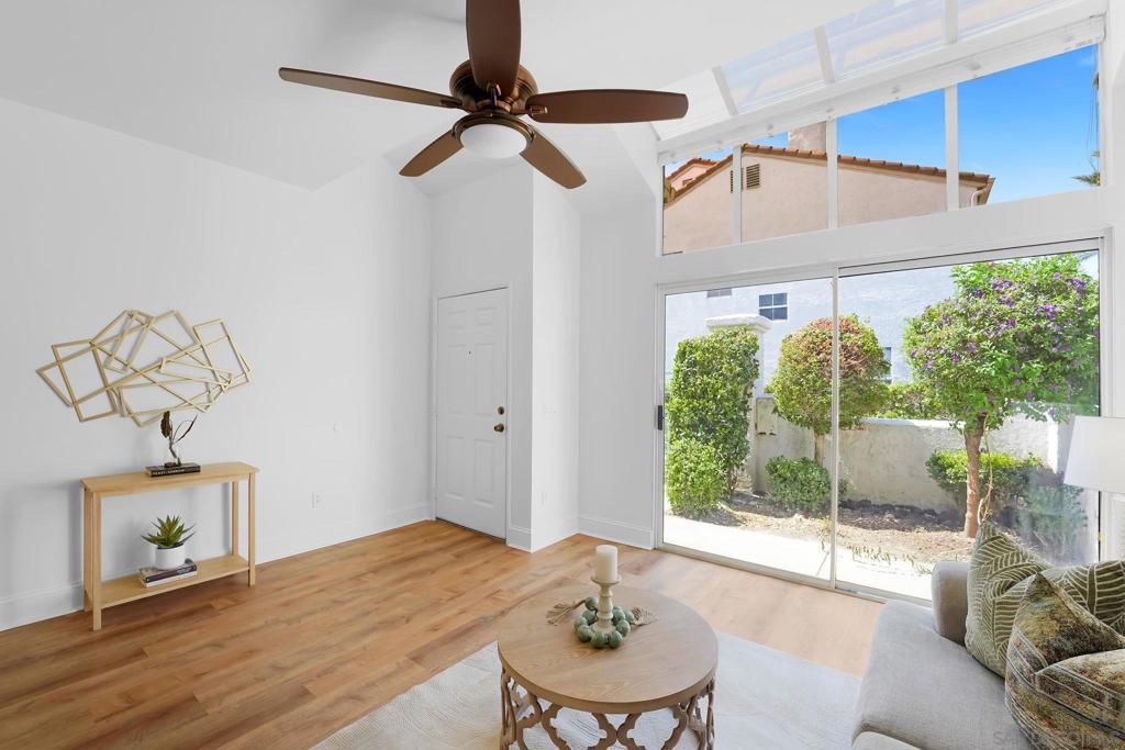 Beautiful, updated 2-bedroom, 2.5-bath condo-style townhome with approximately 1,155 sq ft of light-filled living space. The home showcases luxury vinyl plank flooring, fresh paint, plush carpeted stairs, and wide baseboards that elevate its refined aesthetic. Featuring newer appliances, recessed kitchen lighting, vaulted ceilings, and a large living room window that frames a dramatic atrium, this home offers a bright, open, and airy ambiance. Ideal for entertaining or relaxing, this unit sits just steps from the community pool, clubhouse, and guest parking, blending convenience with resort-style amenities Beautiful, updated 2-bedroom, 2.5-bath condo-style townhome with approximately 1,155 sq ft of light-filled living space. The home showcases luxury vinyl plank flooring, fresh paint, plush carpeted stairs, and wide baseboards that elevate its refined aesthetic. Featuring newer appliances, recessed kitchen lighting, vaulted ceilings, and a large living room window that frames a dramatic atrium, this home offers a bright, open, and airy ambiance. Ideal for entertaining or relaxing, this unit sits just steps from the community pool, clubhouse, and guest parking, blending convenience with resort-style amenities