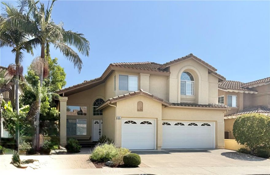 Are you seeking a turnkey residence in the highly desirable community of Foothill Ranch? This exceptional home offers an impressive array of features. Showcasing high ceilings, four spacious bedrooms, two and a half bathrooms, and an expansive backyard ideal for entertaining, this property is designed for both comfort and style. Upon entering, you are greeted by soaring ceilings and a freshly painted interior. Tile flooring extends throughout the main living areas down, complemented by carpeting in the formal spaces and bedrooms. The updated kitchen features white cabinetry, quartz countertops, and premium stainless steel appliances. The adjoining family room is enhanced by a cozy fireplace and sliding doors that open to a beautifully designed patio area. Upstairs, the primary suite provides generous space, complete with a newly remodeled walk-in shower and dual vanity. The additional bedrooms are equally spacious, while the third bathroom includes a dual vanity and a private shower area. A three-car garage provides ample parking and storage options. Residents of Foothill Ranch enjoy access to outstanding community amenities, including a pool, spa, clubhouse, tennis courts, parks, and sports facilities. The property is conveniently located within walking distance of the award-winning Foothill Ranch Elementary School and the public library. Outdoor enthusiasts will appreciate the nearby Whiting Ranch Wilderness Park, offering scenic hiking and biking trails. Ideally situated near restaurants, shopping centers, the Irvine Spectrum, and major toll road access, this home presents a rare opportunity that will not last long.